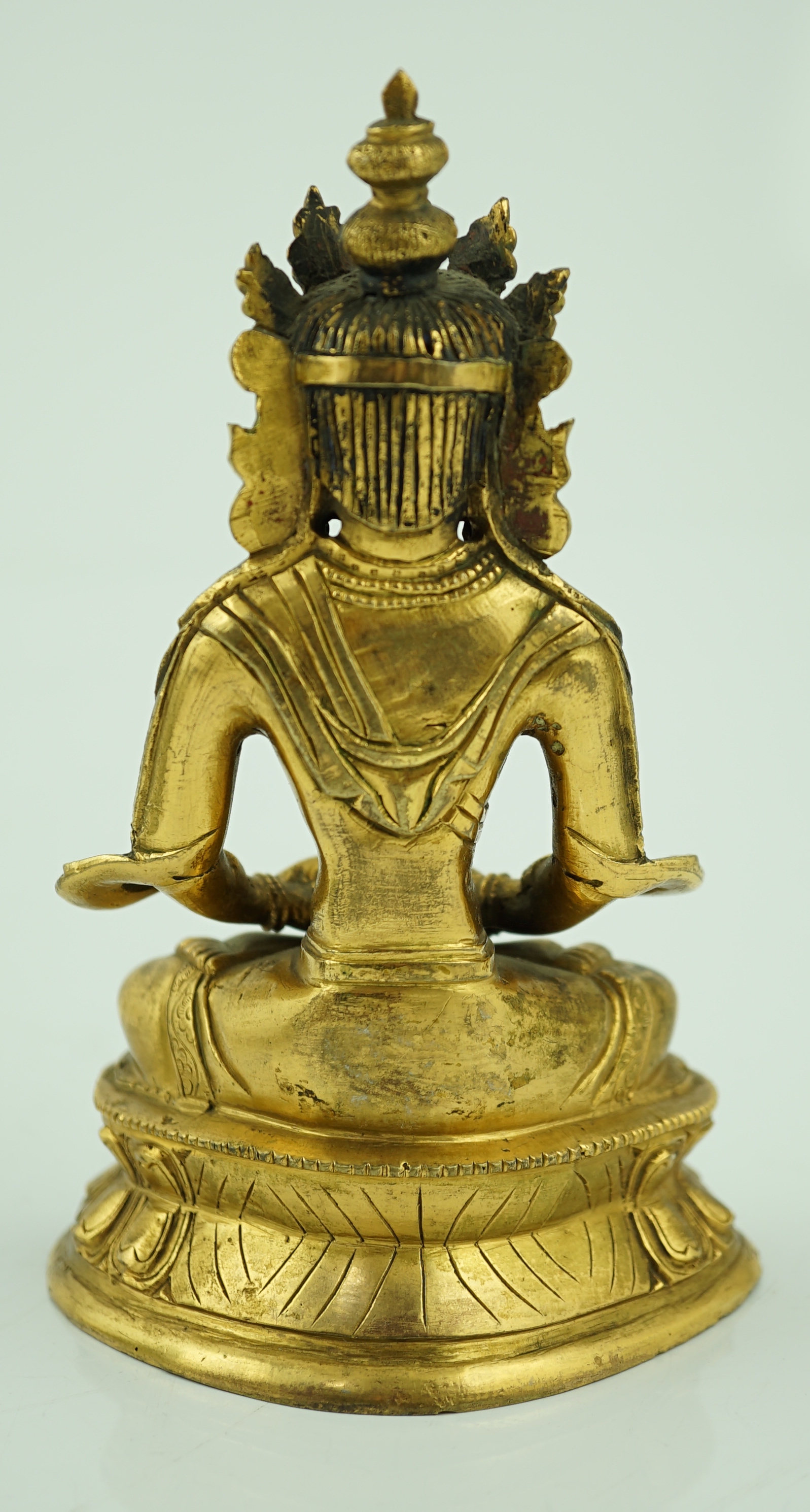 A Tibetan gilt bronze figure of Avalokeshvara, 18th century